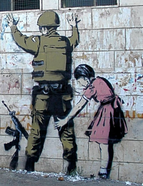 20091118we-banksy-girl-frisking-cop-police-officer